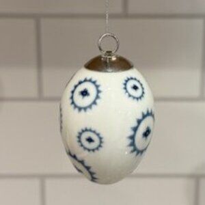 Royal Copenhagen Porcelain Blue Fluted Egg Ornament in Nest - 2.5 Inches